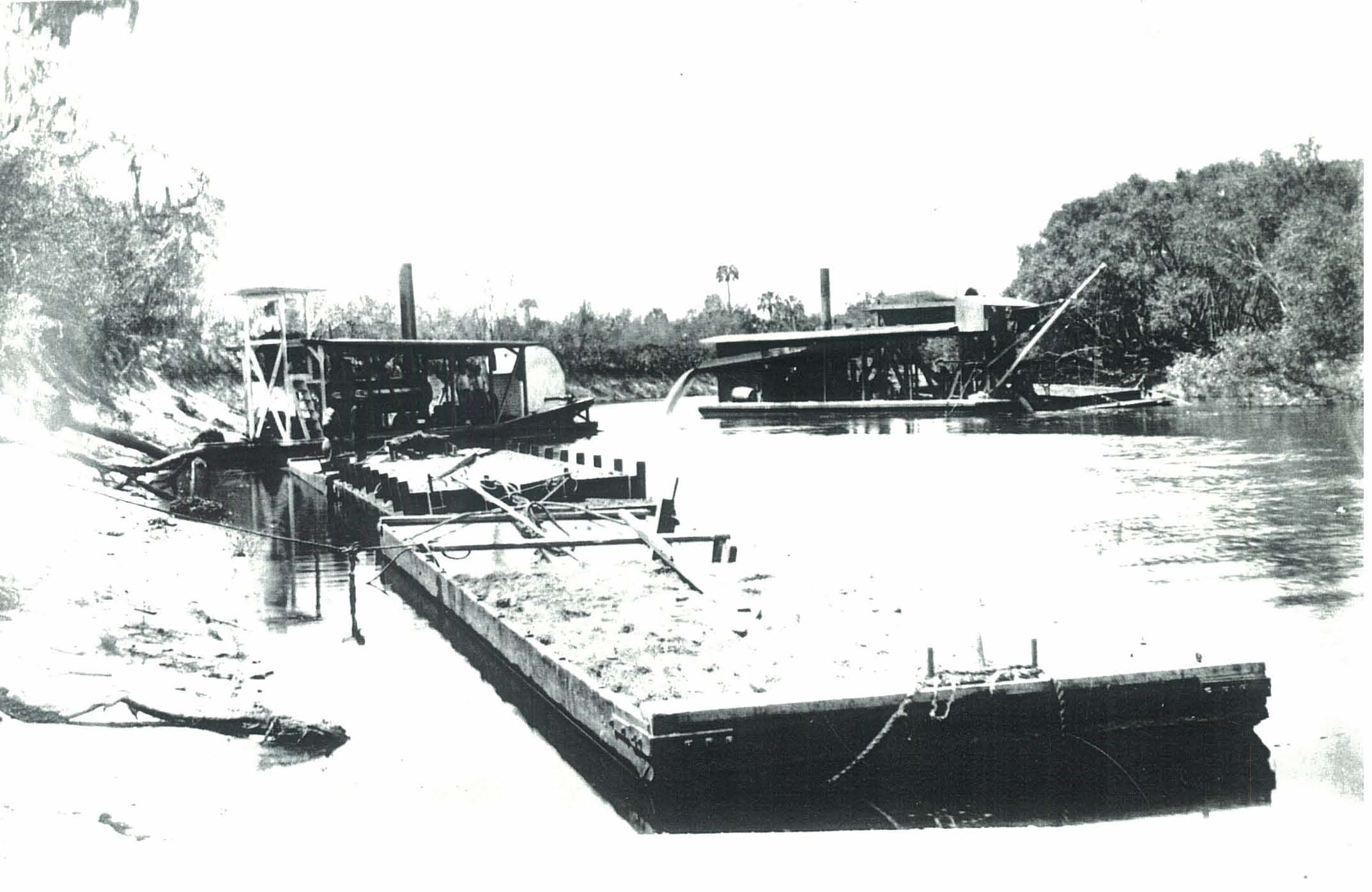 tug, barges and dredge